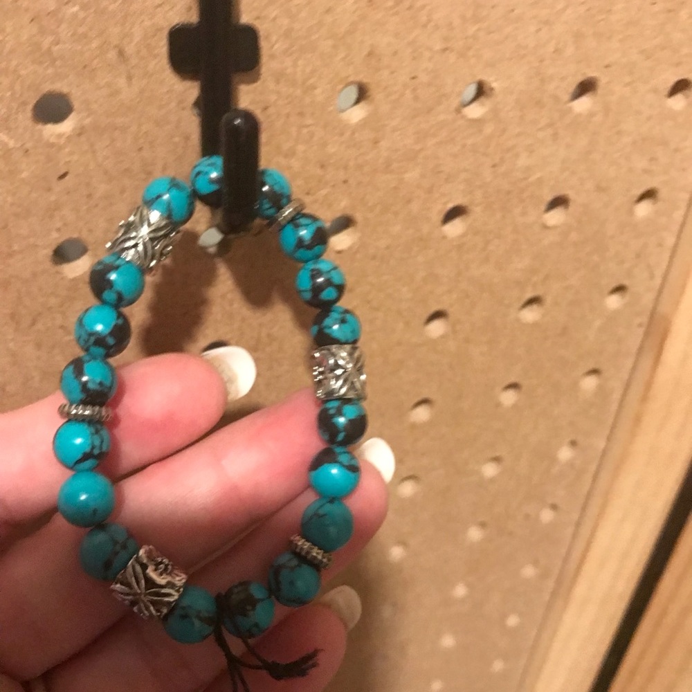 Greenish aqua & black stretch bracelet.